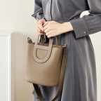 Minimalist Bucket Bag With Top Handles And Shoulder Strap