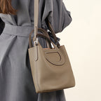 Minimalist Bucket Bag With Top Handles And Shoulder Strap