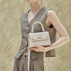 Stylish Kelly Bag With Top Handles And Shoulder Strap