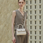Stylish Kelly Bag With Top Handles And Shoulder Strap